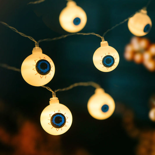 Niz LED luči za noč čarovnic - oči - 12 LED diod - 2 x AA - 1,65 m IP20
